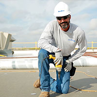male roofer looking at camera