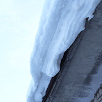 snow accumulation on flat roof