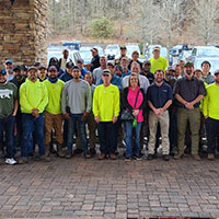 a group of roofers posing together