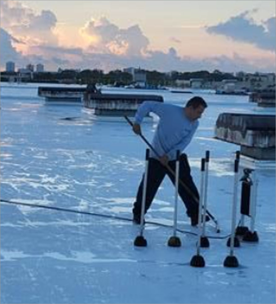 commercial roofer installing TPO