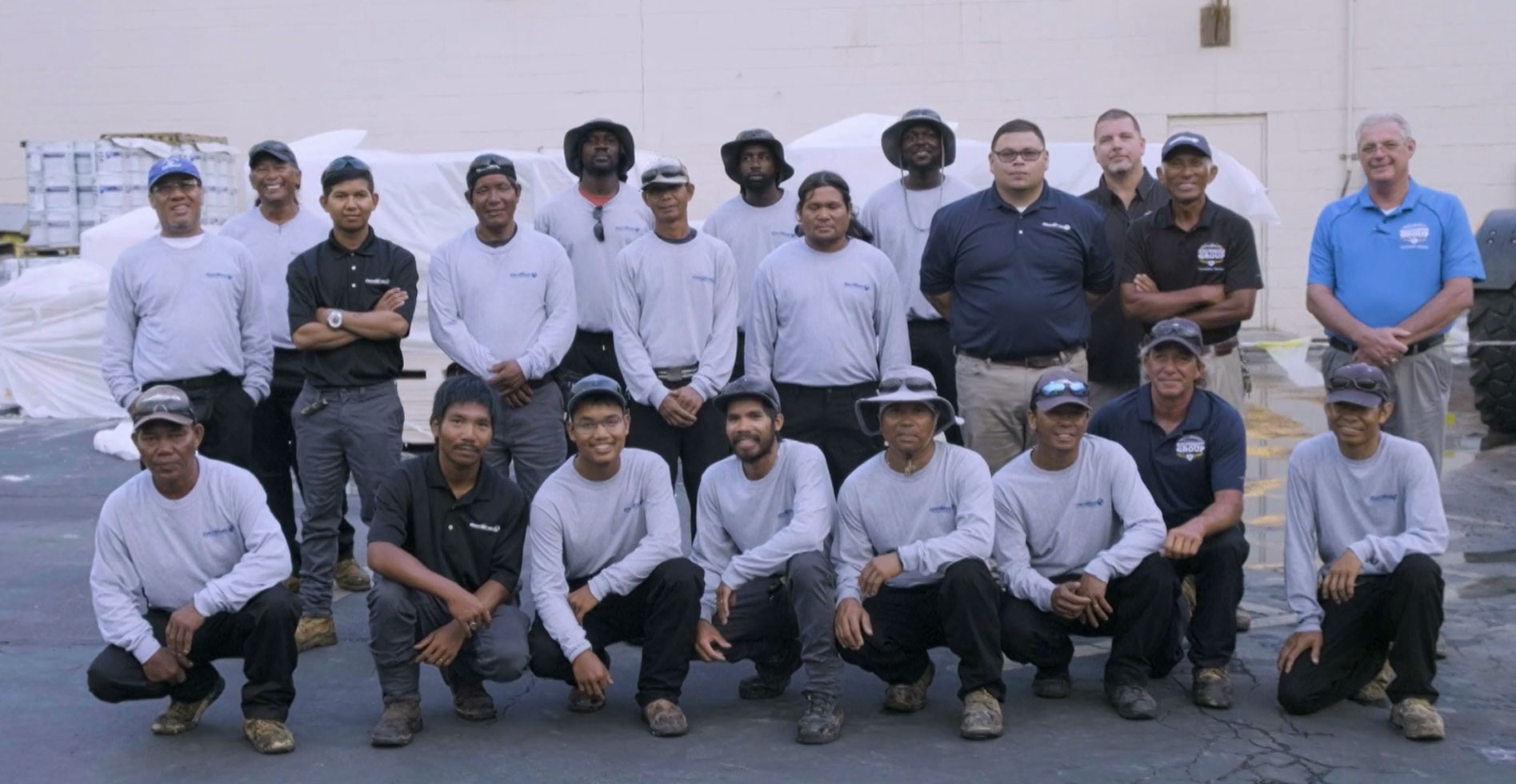 a group of centimark employees posing for camera