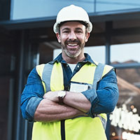 smiling roofing professional looking at the camera