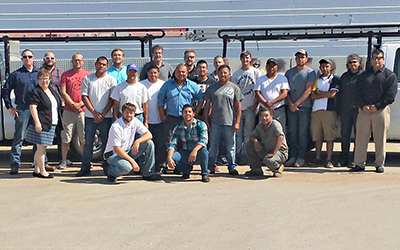 CentiMark's Iowa team of commercial roofing contractors posing for camera