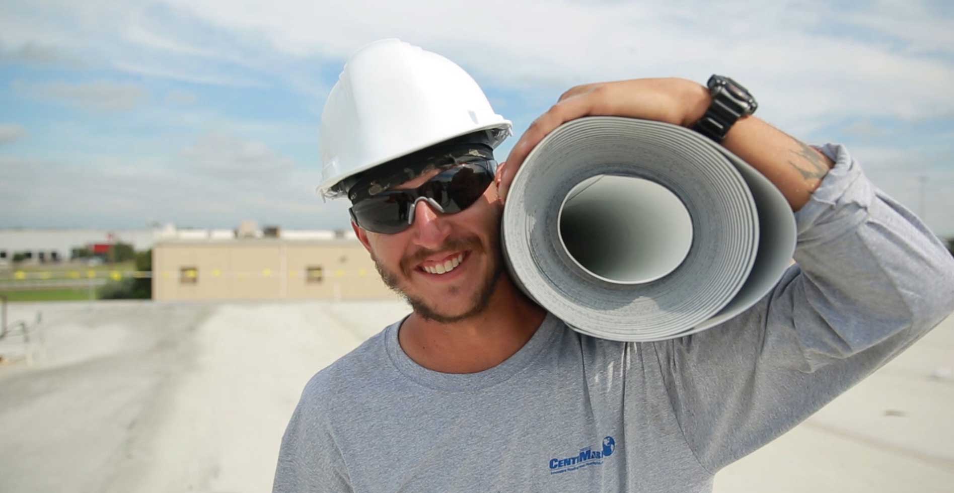 smiling centimark roofer looking at the camera