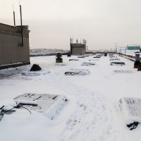 snow on a commercial flat roof