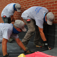 centimark crew working on a roof