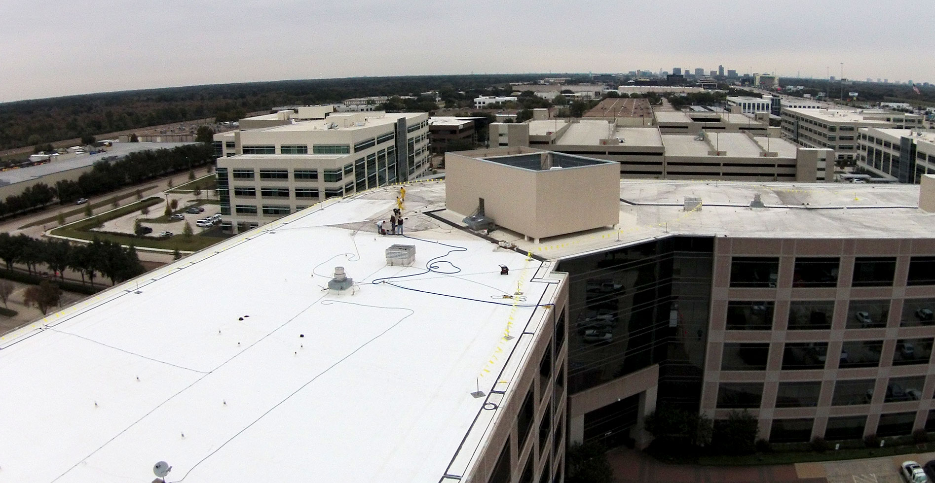 drone operators on construction site