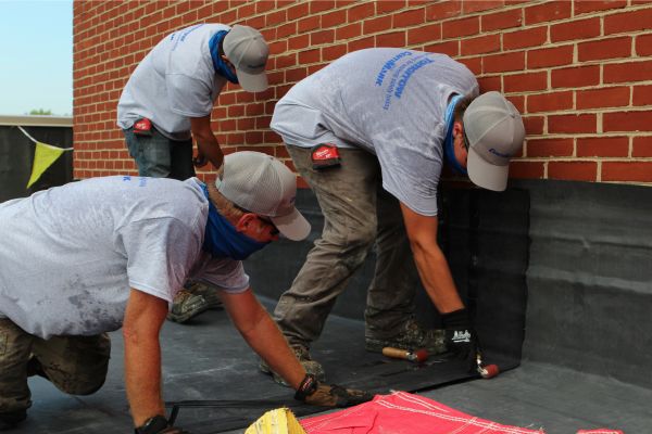 CentiMark crew working on a roof