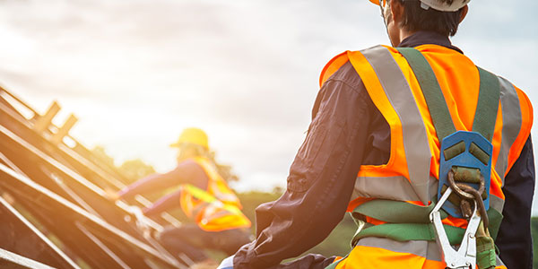 roof worker with harness