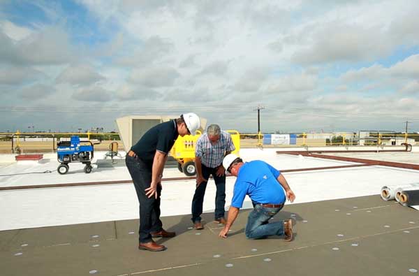 roofers looking at quality of the roofs